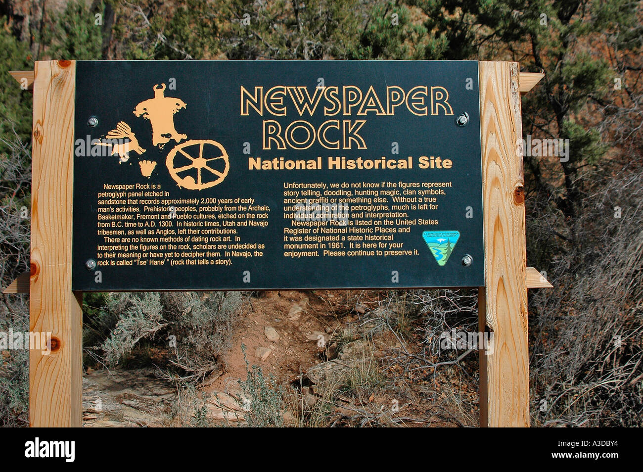 Sign explaining the history and origins of Newspaper Rock in southern