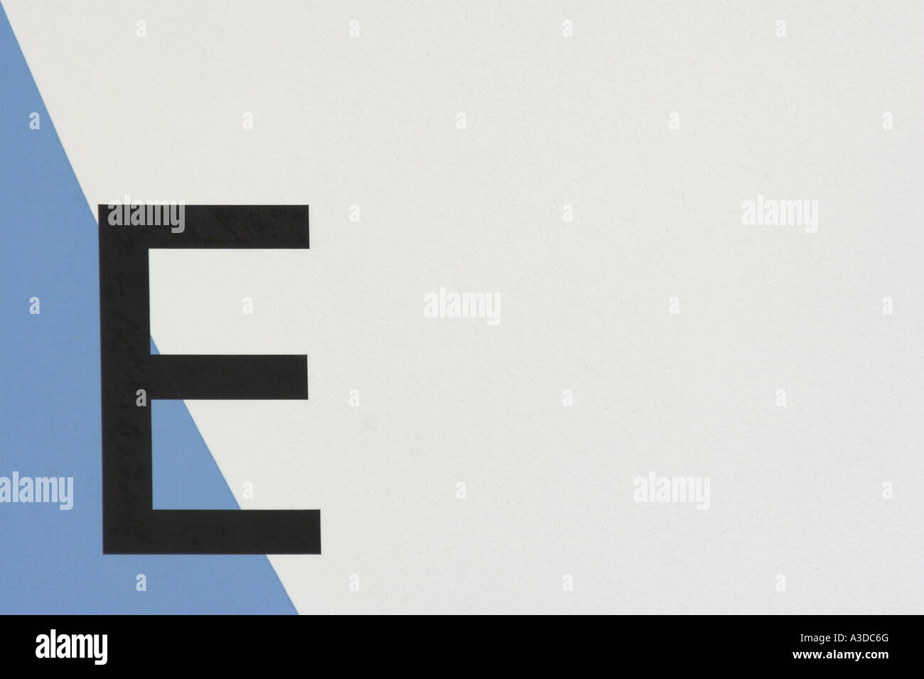 The letter E on a blue & white background Stock Photo - Alamy