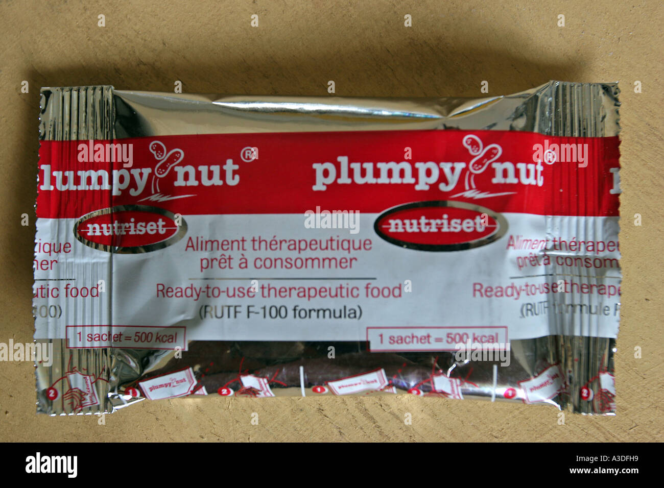 Plumpy nut an RUTF F100 formula a food supplement supplied by the WFP distributed by Merlin Turkana Northern Kenya Stock Photo