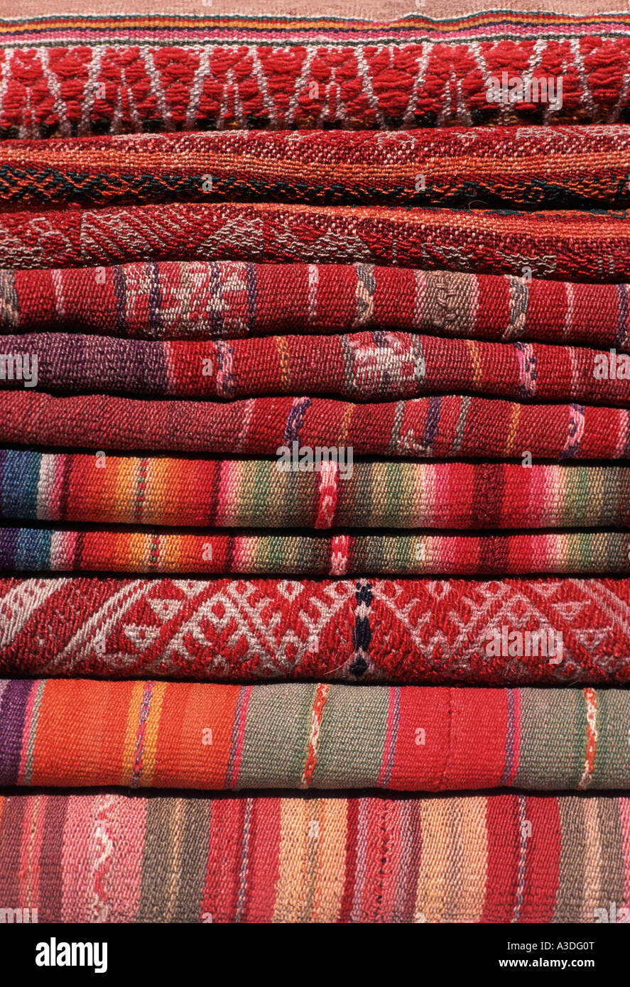 Stack of Andean fabrics from Peru and Bolivia As sold in the markets of La Paz Bolivia and Cuzco Pisac Peru Stock Photo