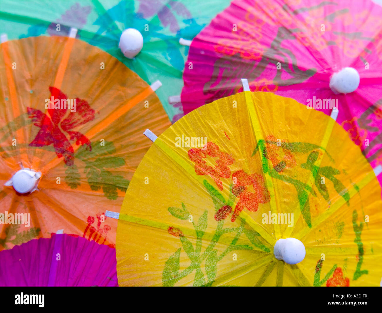 A closeup shot of some colourful cocktail umbrellas used in drinks Stock Photo