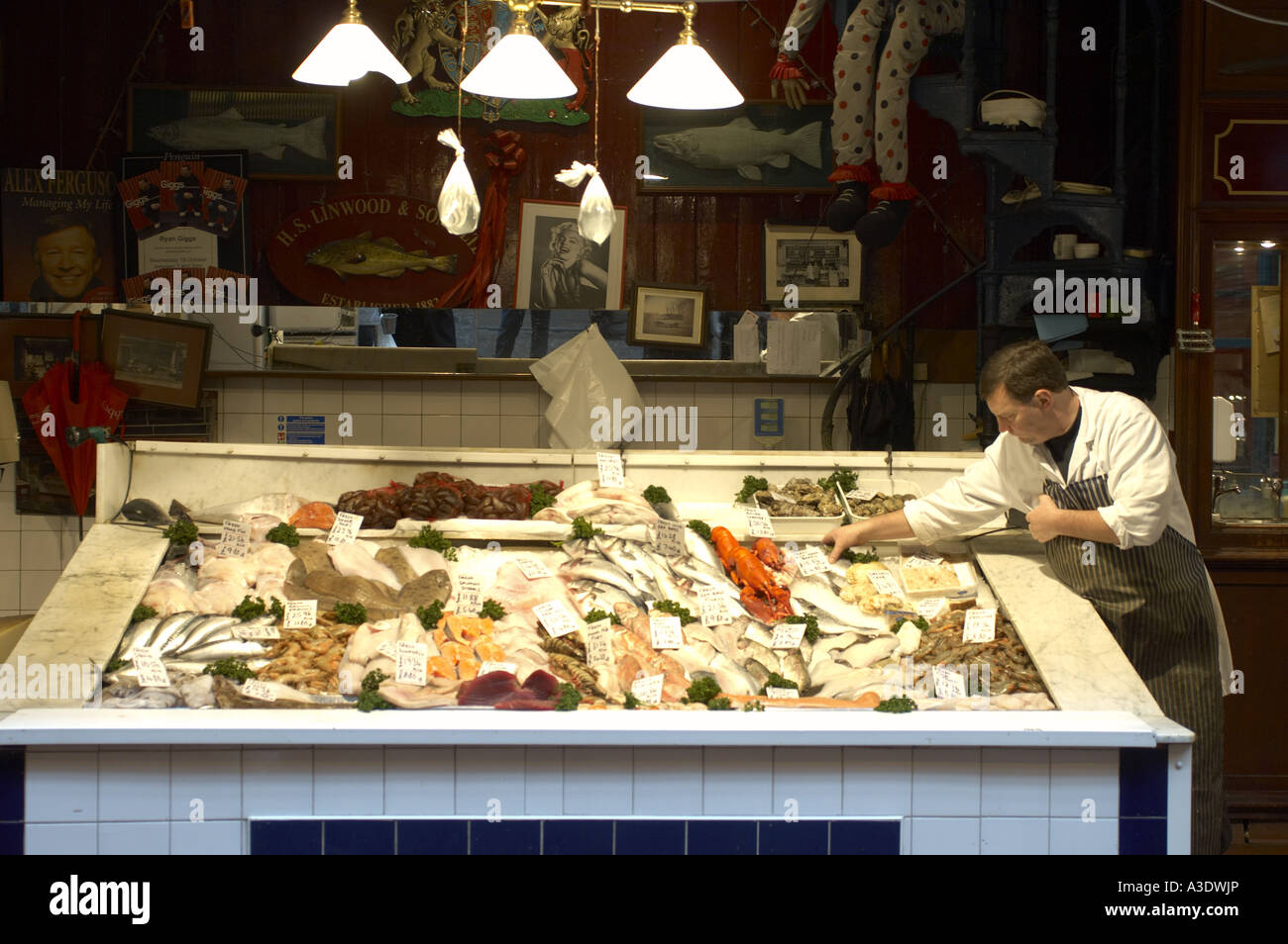 H S Linwood Sons in Leadenhall covered Victorian market Stock Photo Alamy