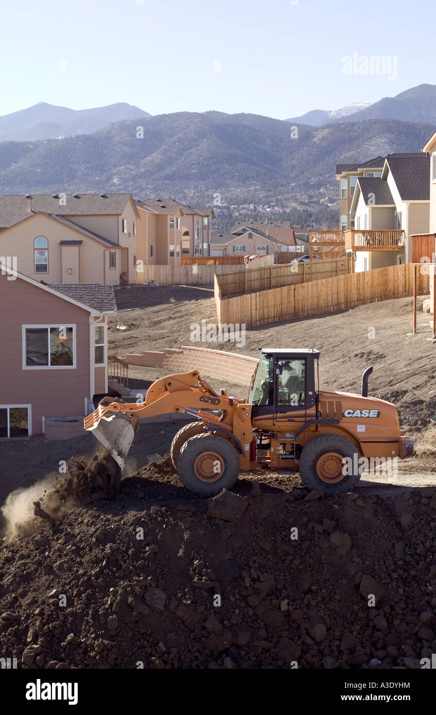 FrontEnd Loader Moving Dirt At Residential Construction Site, Colorado