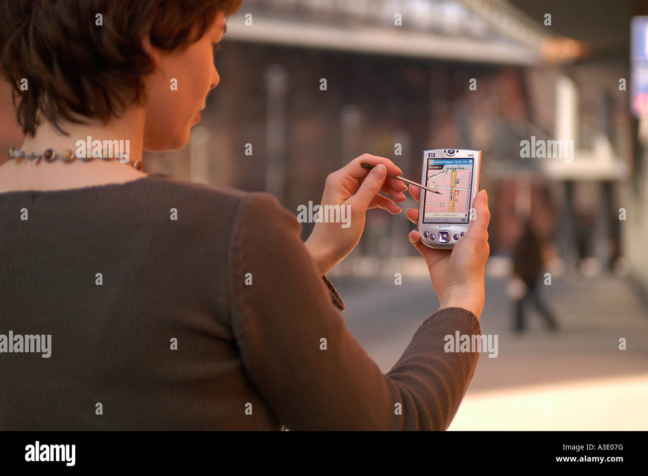 Pedestrian with navigation system Stock Photo Alamy