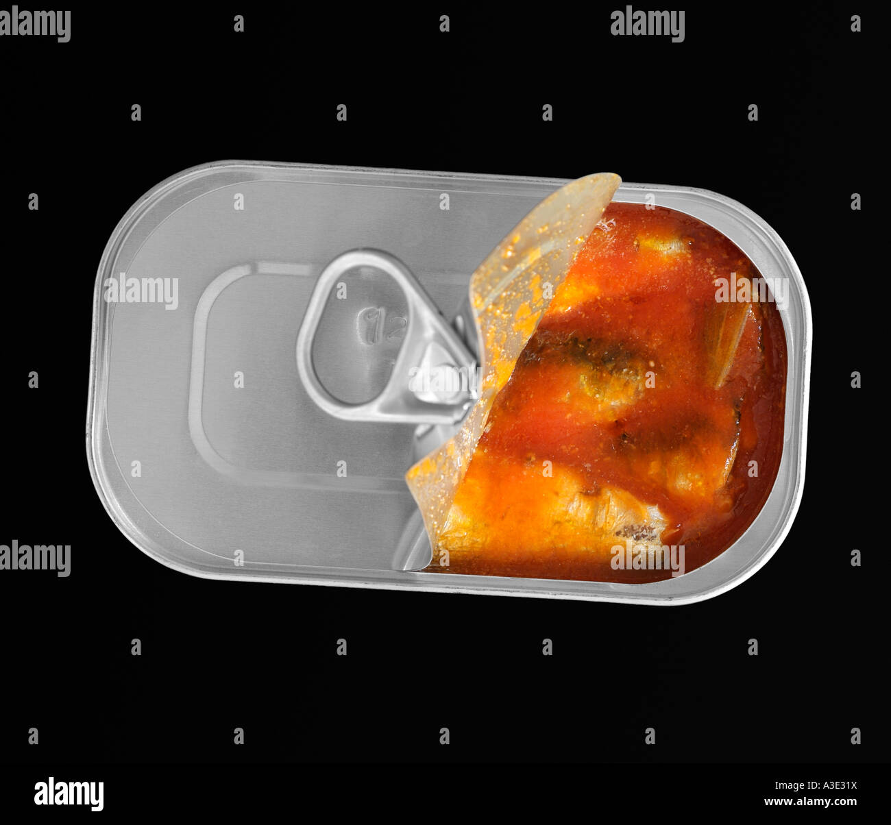 Sardines in a Tin Against a Black Background Stock Photo