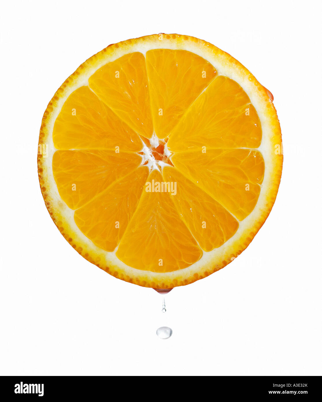 Orange Half Freshly Cut Against a White Background Stock Photo