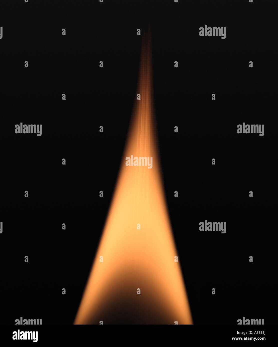 Flame Against a Black Background Stock Photo