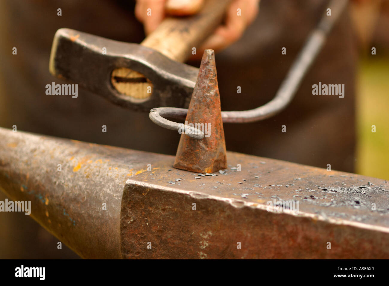 Hammer, anvil and work piece Stock Photo Alamy