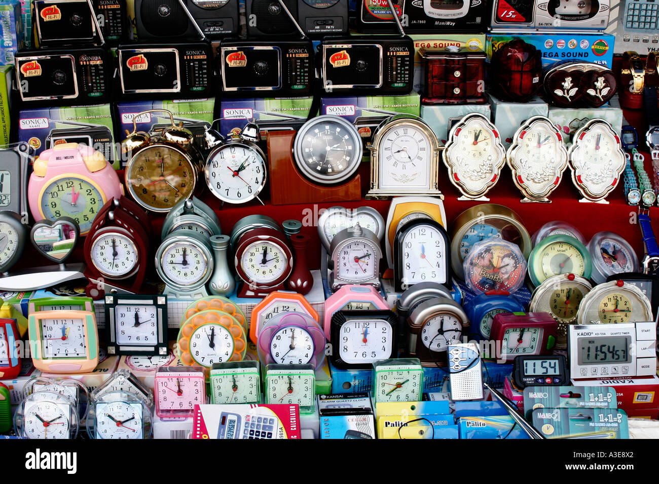 Sri Lanka, alarm clocks of all different designs on market stall Stock