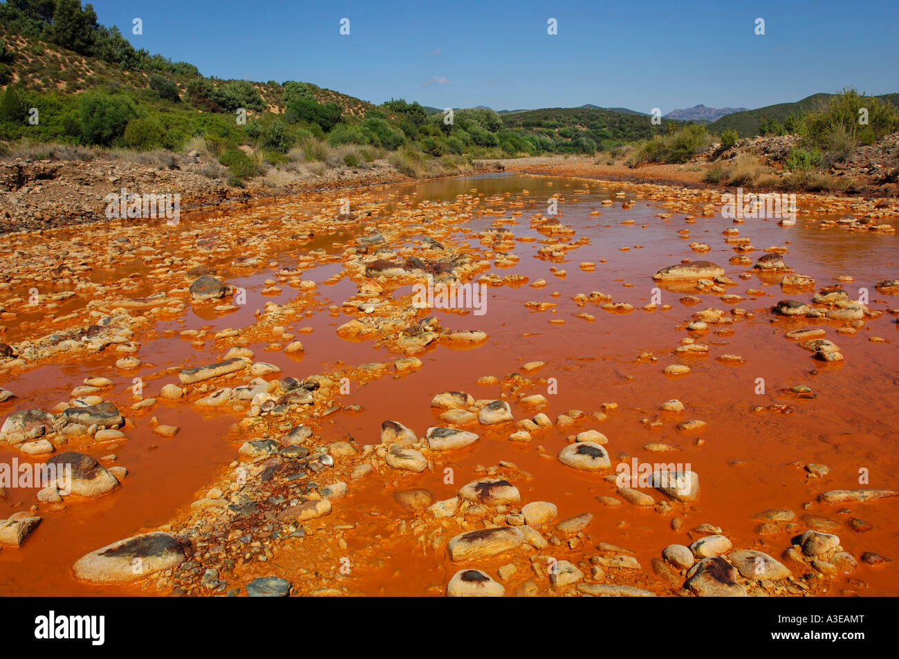 Zinc blende colouring the water of the Ivi river, Sardinia, Italy Stock