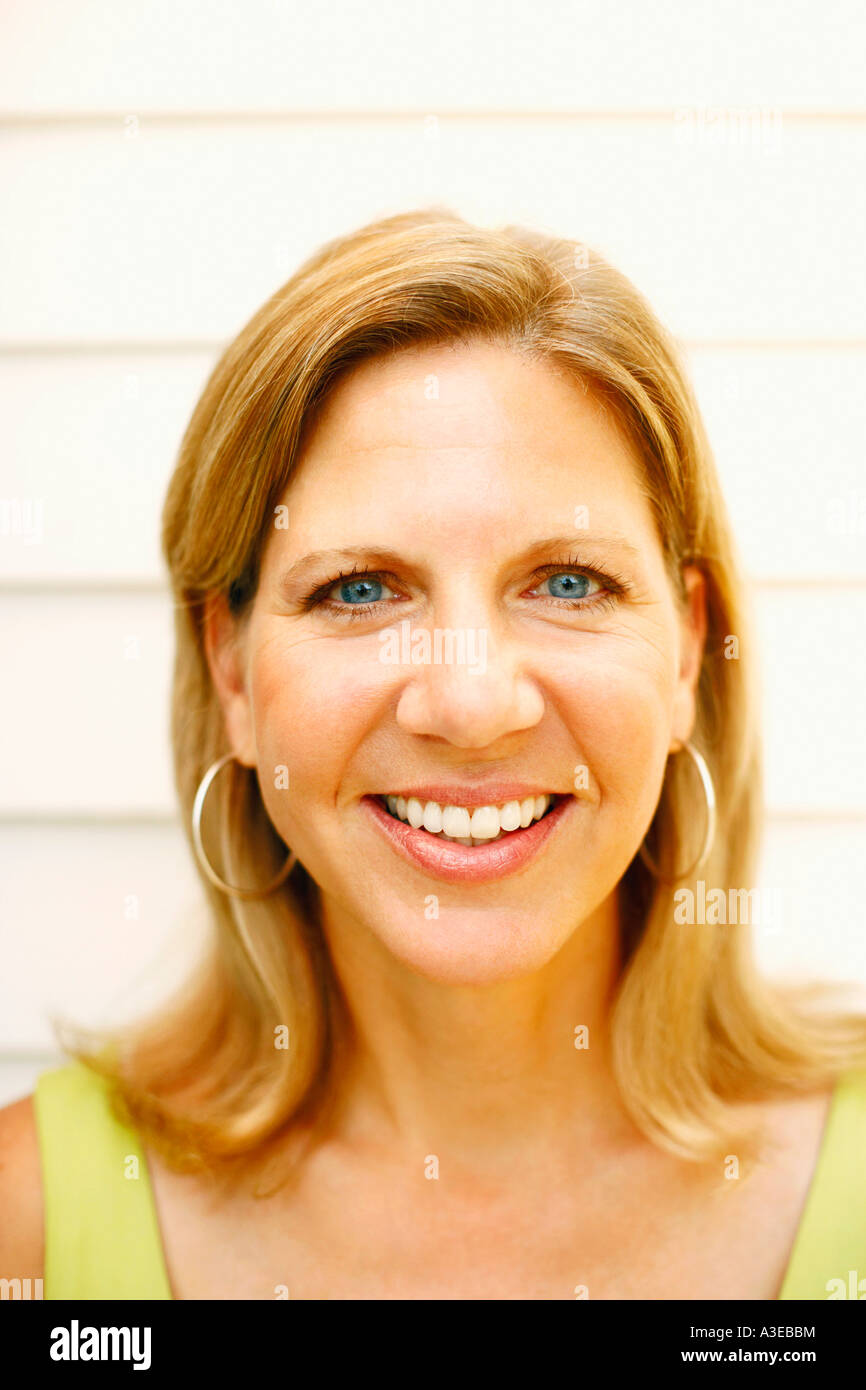 Portrait of a mature woman smiling Stock Photo - Alamy