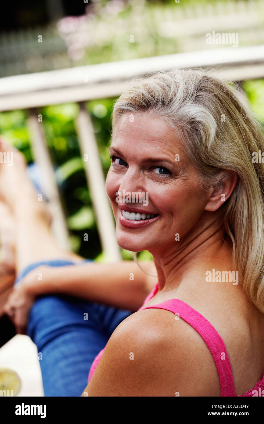 Portrait of a mature woman smiling Stock Photo