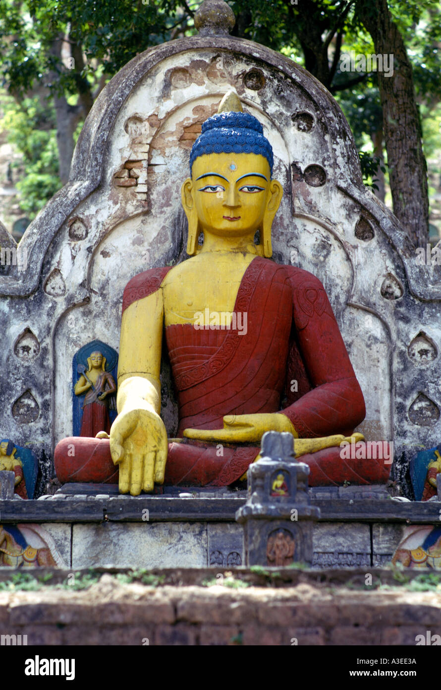 Seated Dhyani Buddha at the foot of the SwayanBuddha Swayambhunath Buddhist temple in Kathmandu Nepal Stock Photo