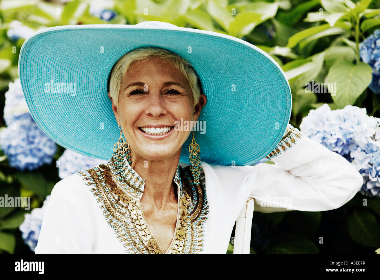 Portrait of a senior woman smiling Stock Photo - Alamy