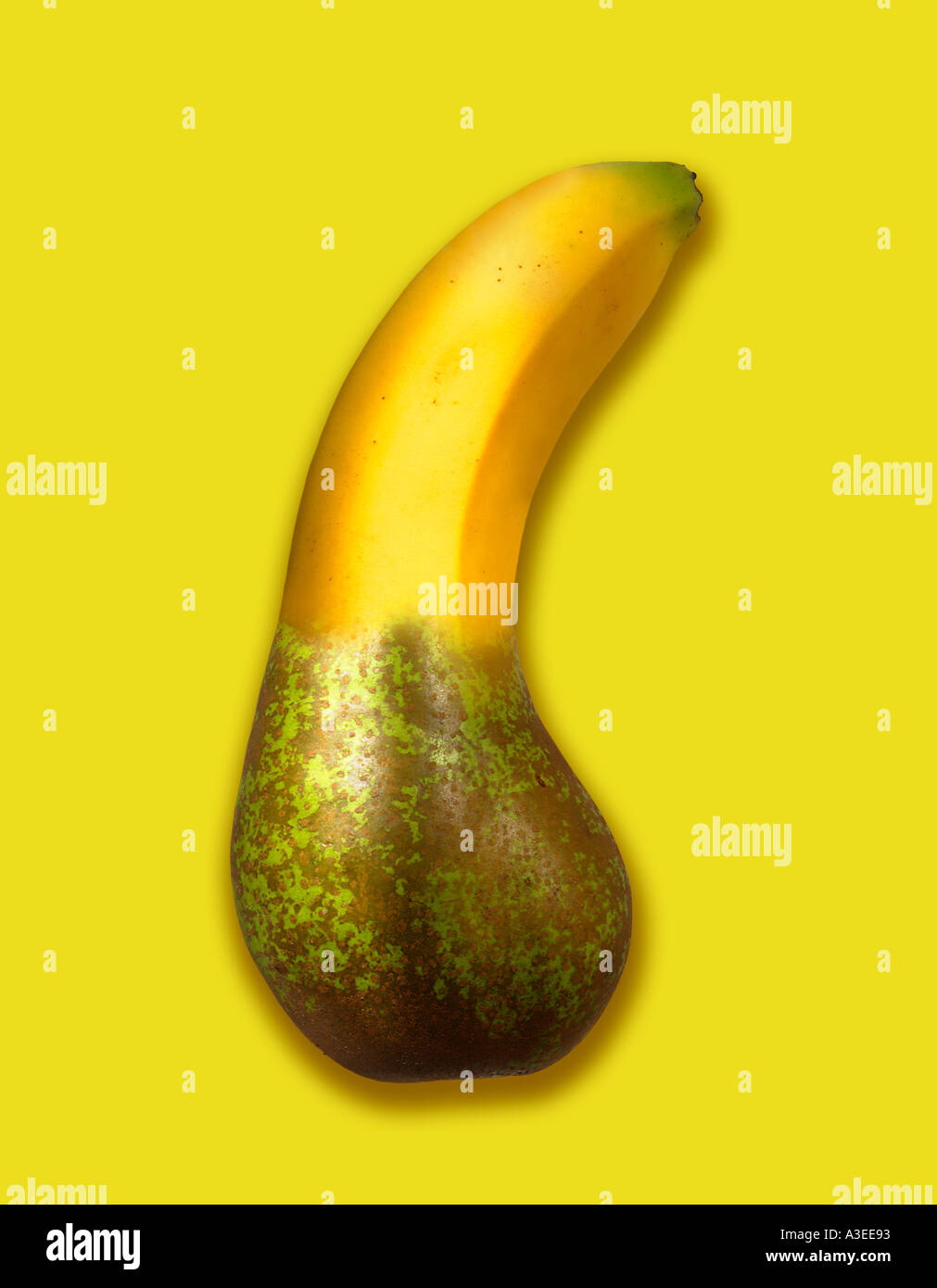 SURREAL MONTAGE OF BANANA AND PEAR Stock Photo