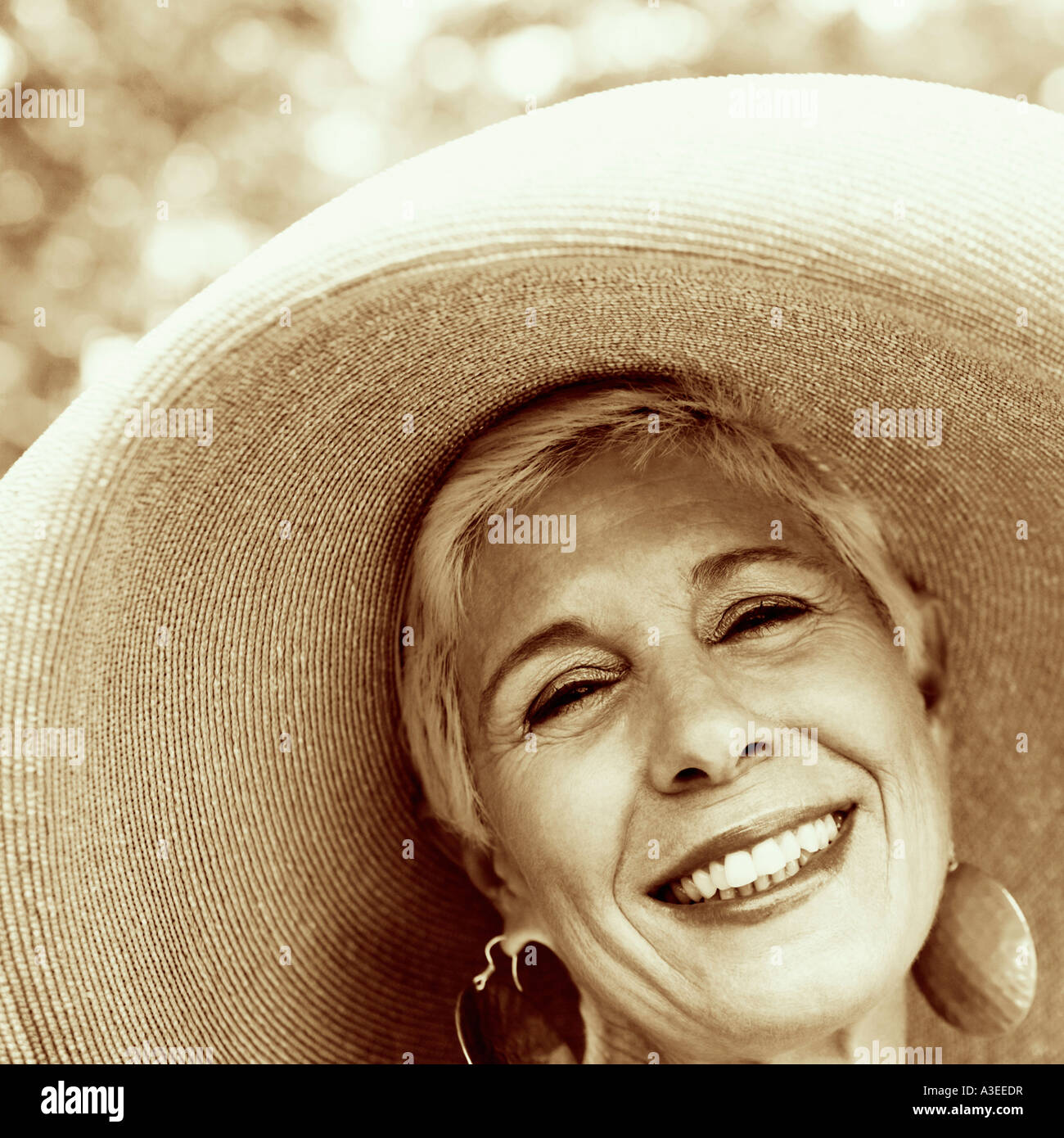 Portrait of a senior woman smiling Stock Photo - Alamy