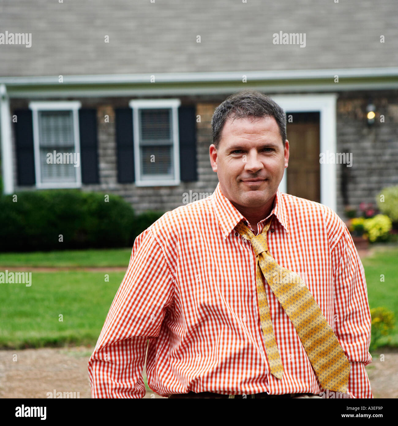 Portrait of a businessman smiling Stock Photo - Alamy