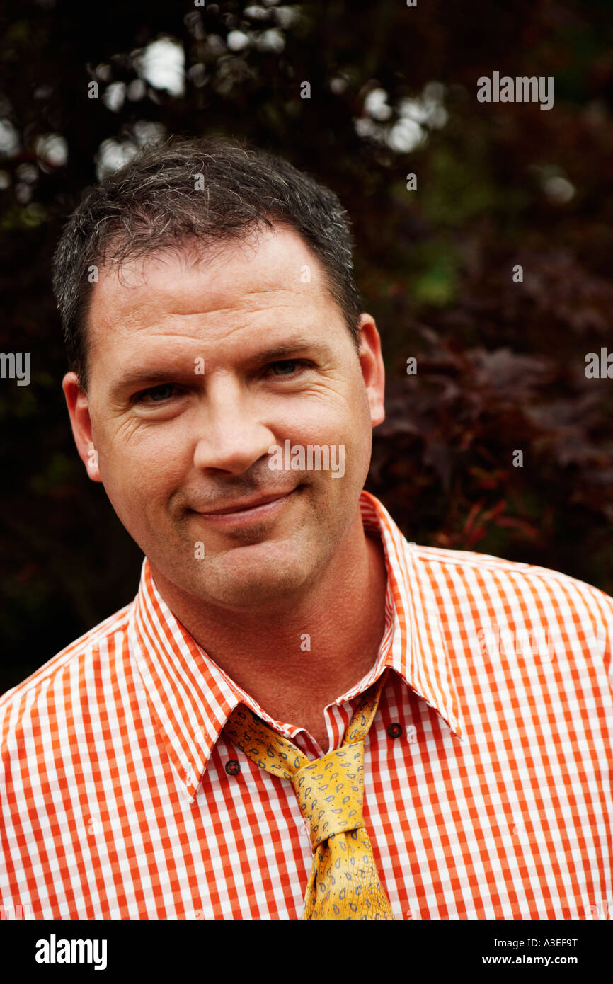 Portrait of a businessman smiling Stock Photo - Alamy