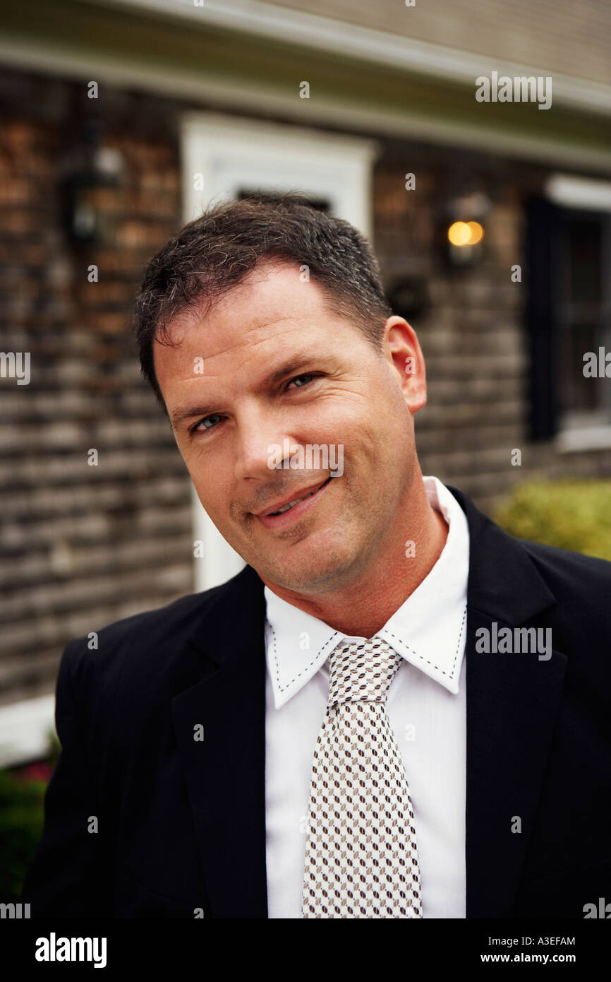 Portrait of a businessman smiling Stock Photo - Alamy