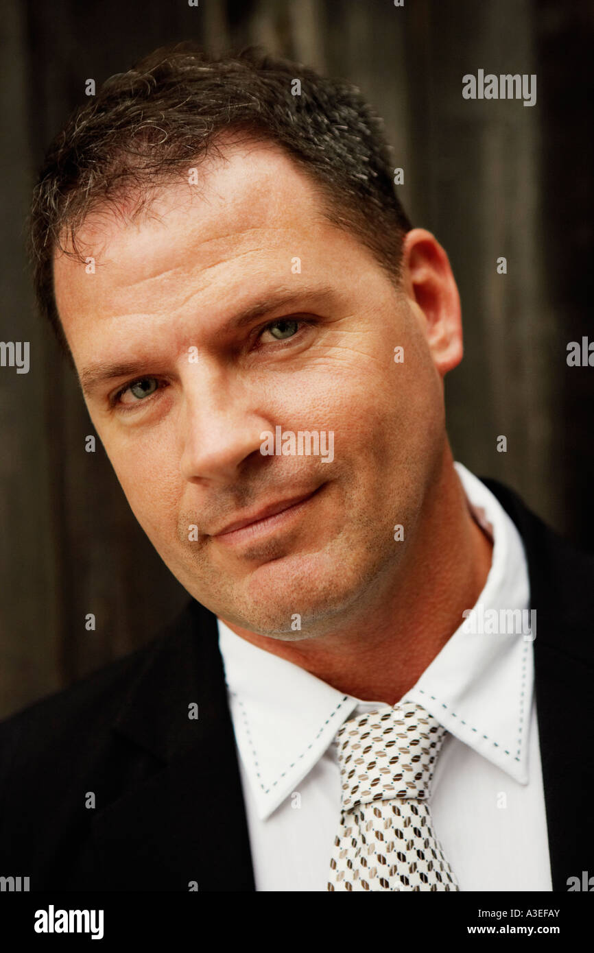 Portrait of a businessman smiling Stock Photo - Alamy