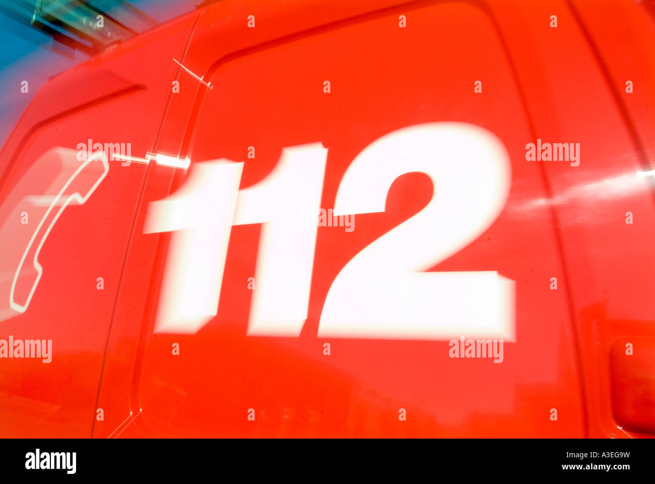 112, the emergency call number from the fire brigade in germany shown on a car Stock Photo