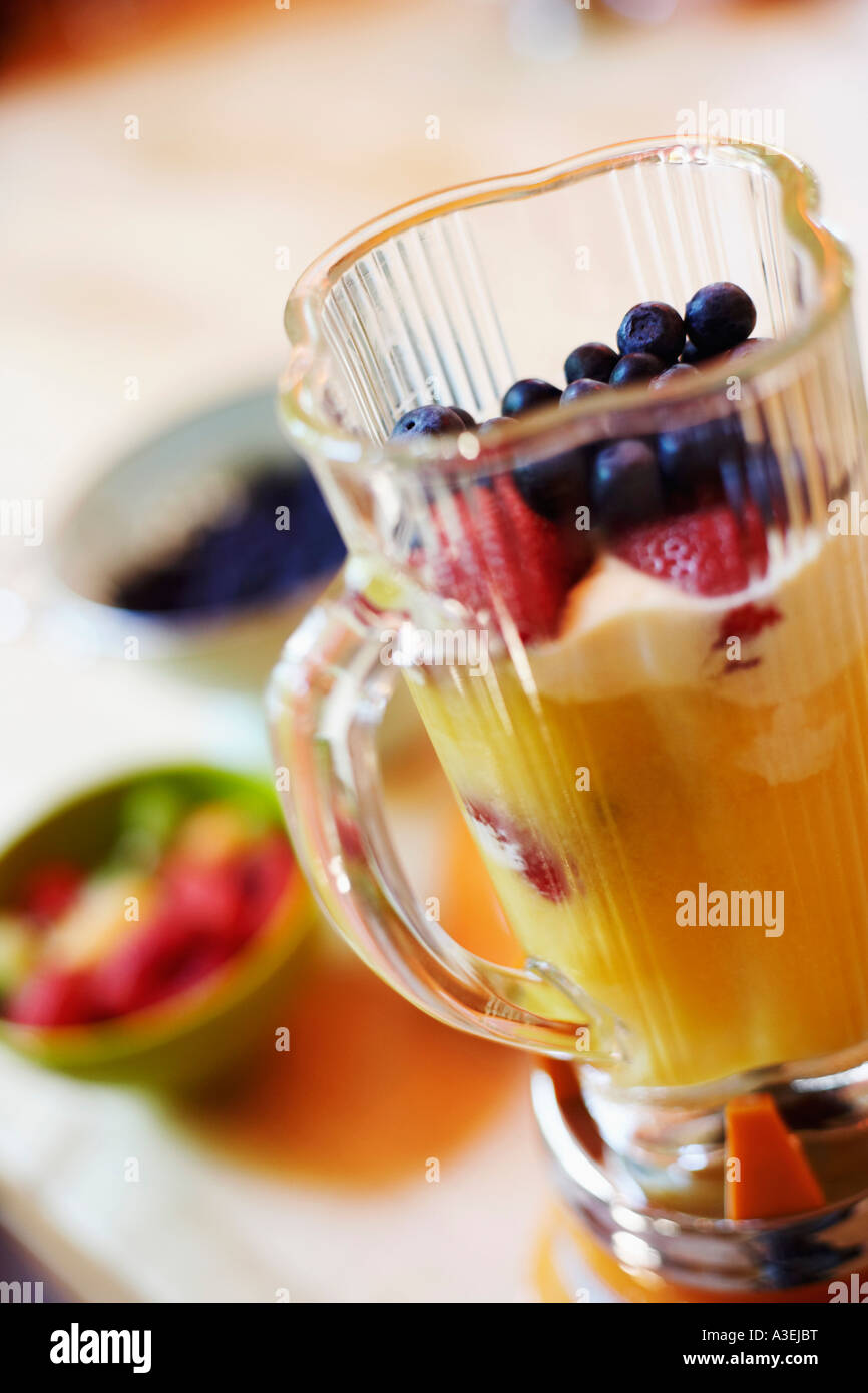 Mango shake in an electric mixer Stock Photo Alamy