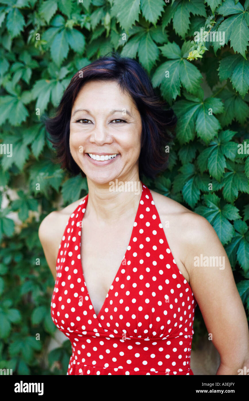 Portrait of a mature woman smiling Stock Photo - Alamy