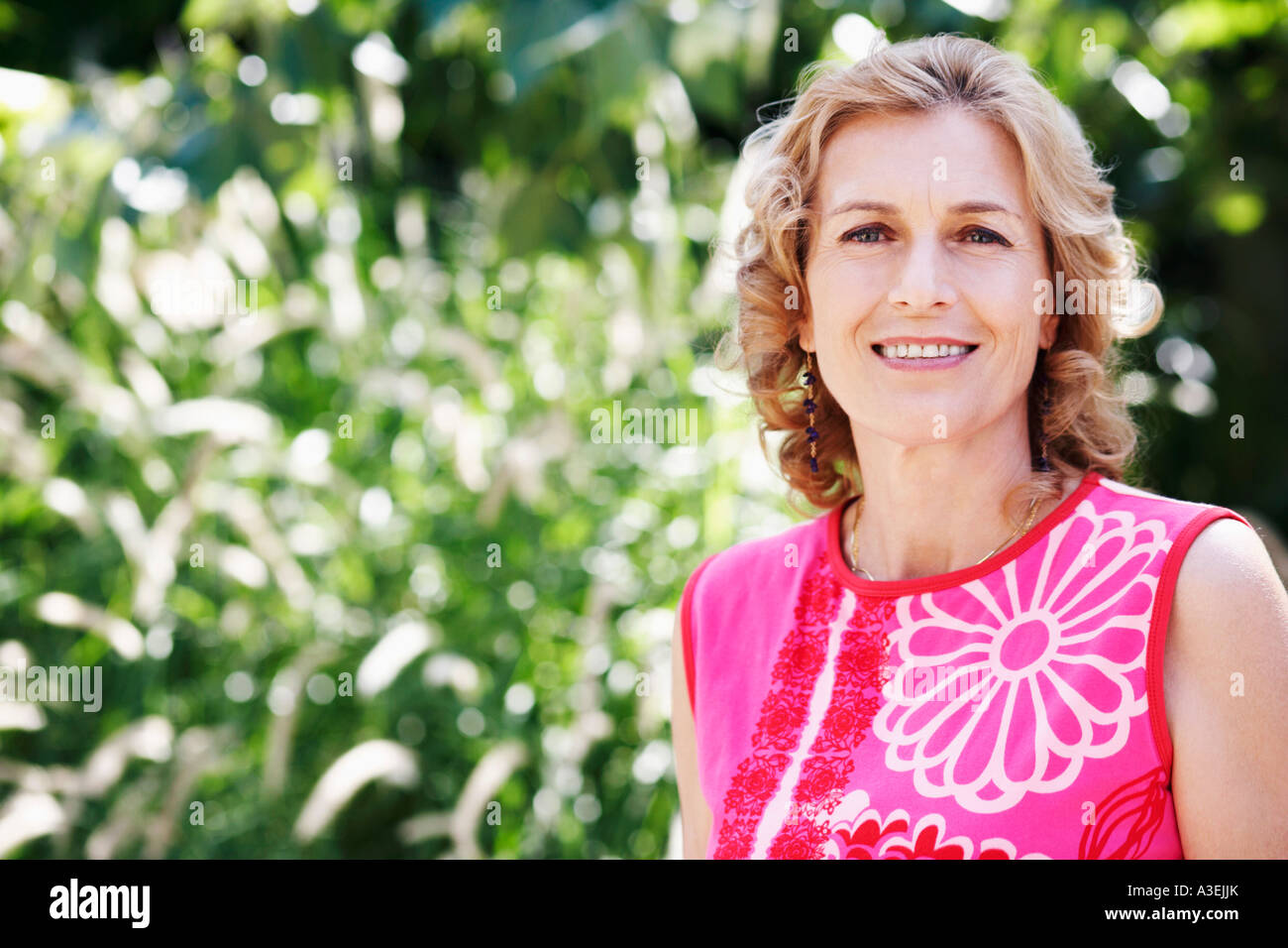 Portrait of a mature woman smiling Stock Photo - Alamy