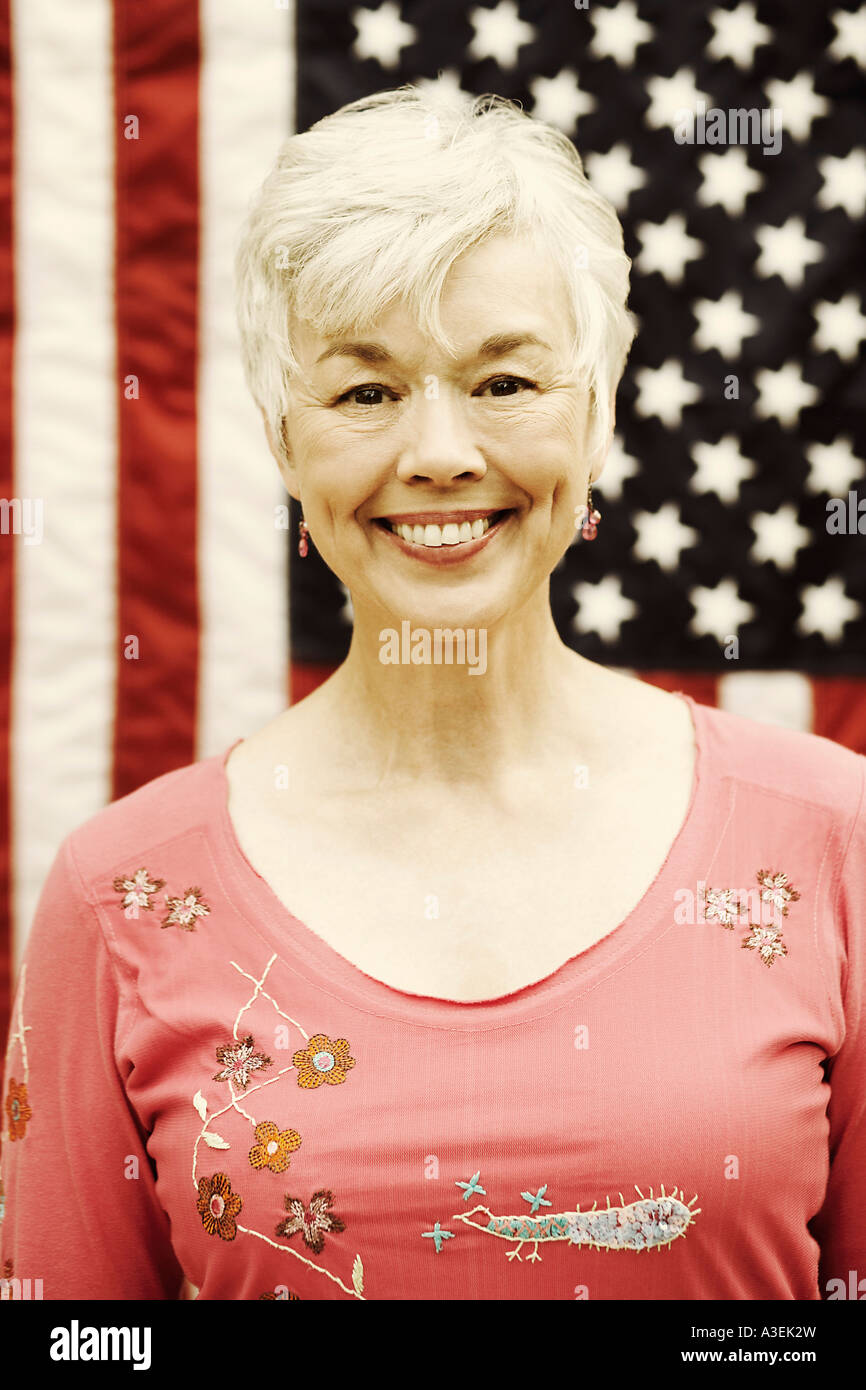 Portrait of a senior woman smiling Stock Photo - Alamy