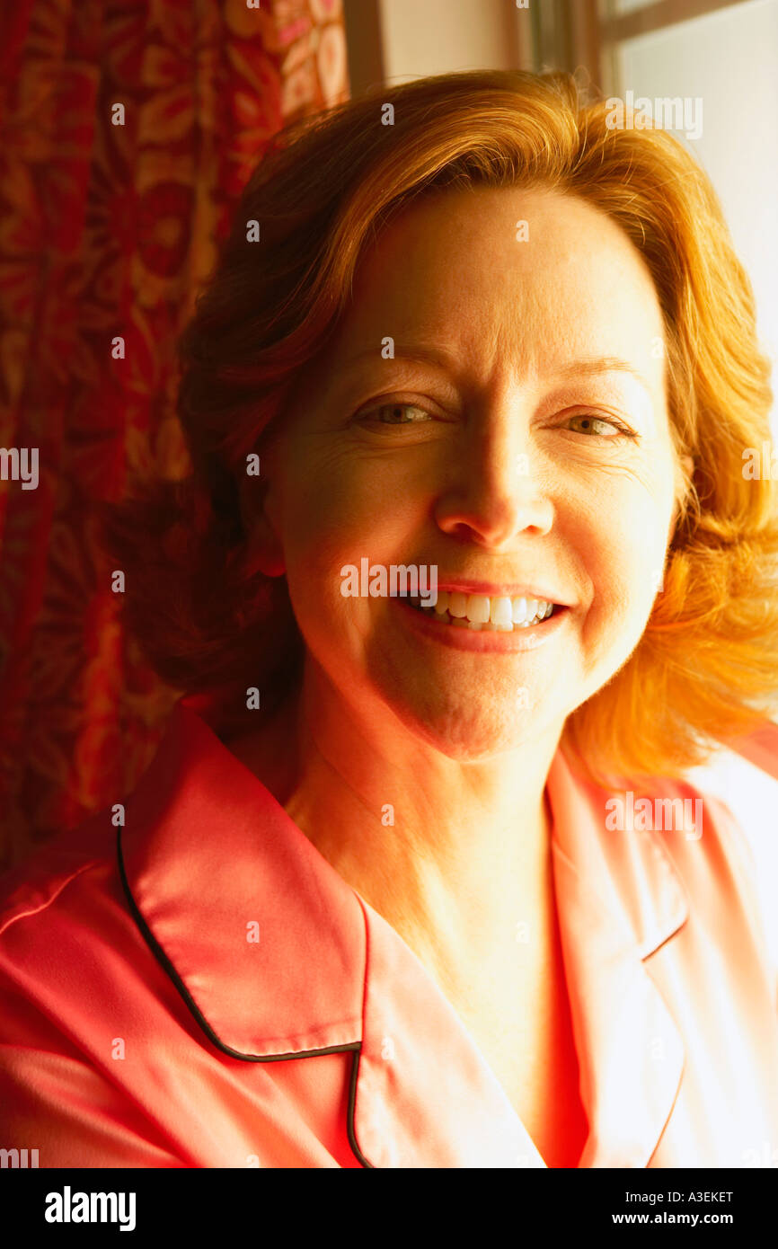 Portrait of a mature woman smiling Stock Photo - Alamy