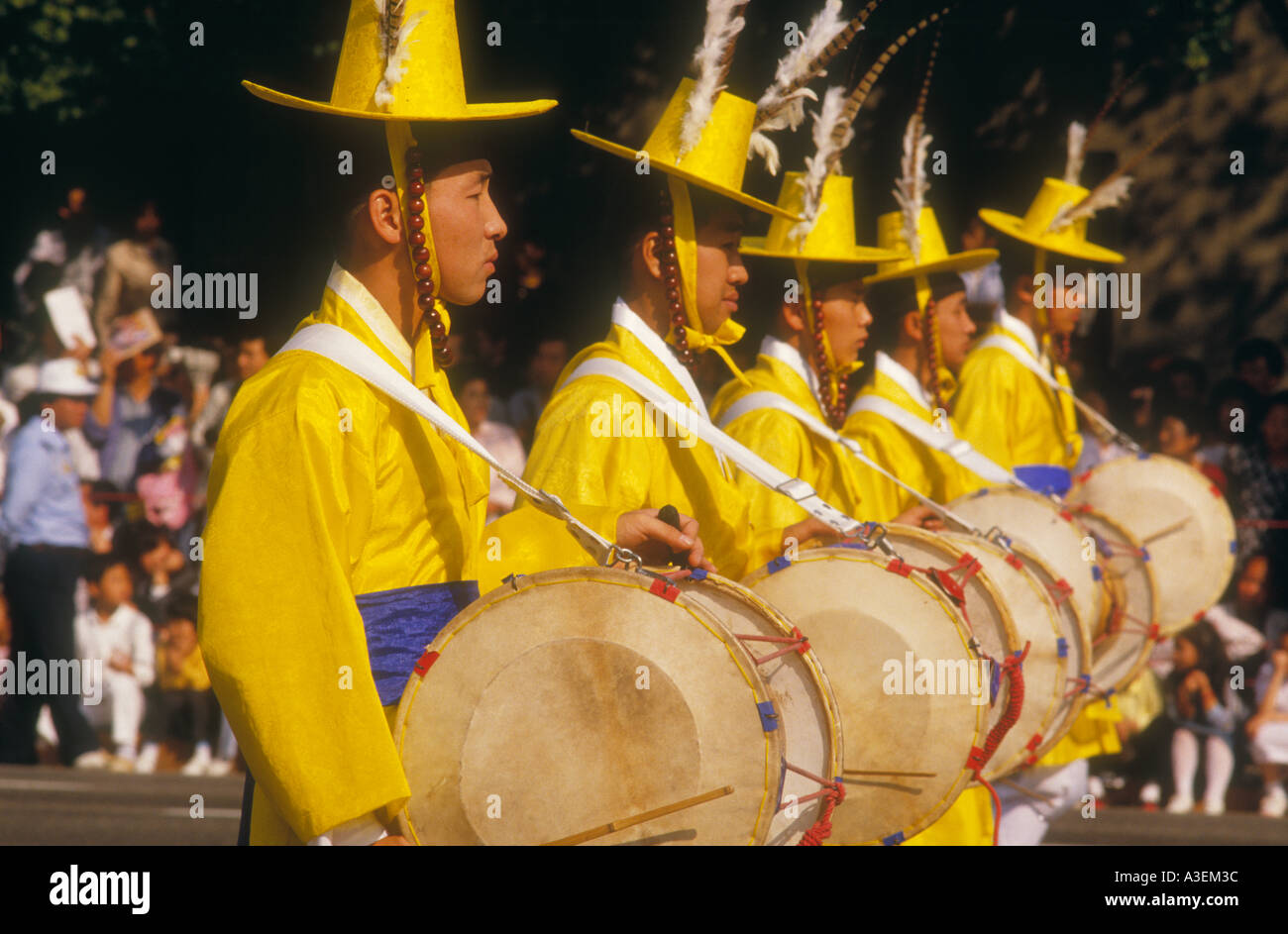 south korea south korea asia asian oriental parade olympia drum costume men celebration red yello blue flag national pride seoul Stock Photo
