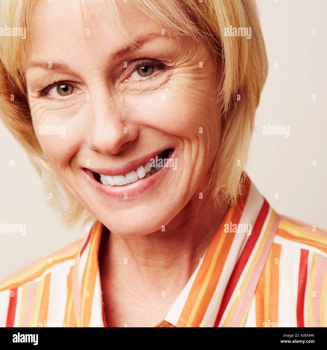 Portrait of a mature woman smiling Stock Photo - Alamy