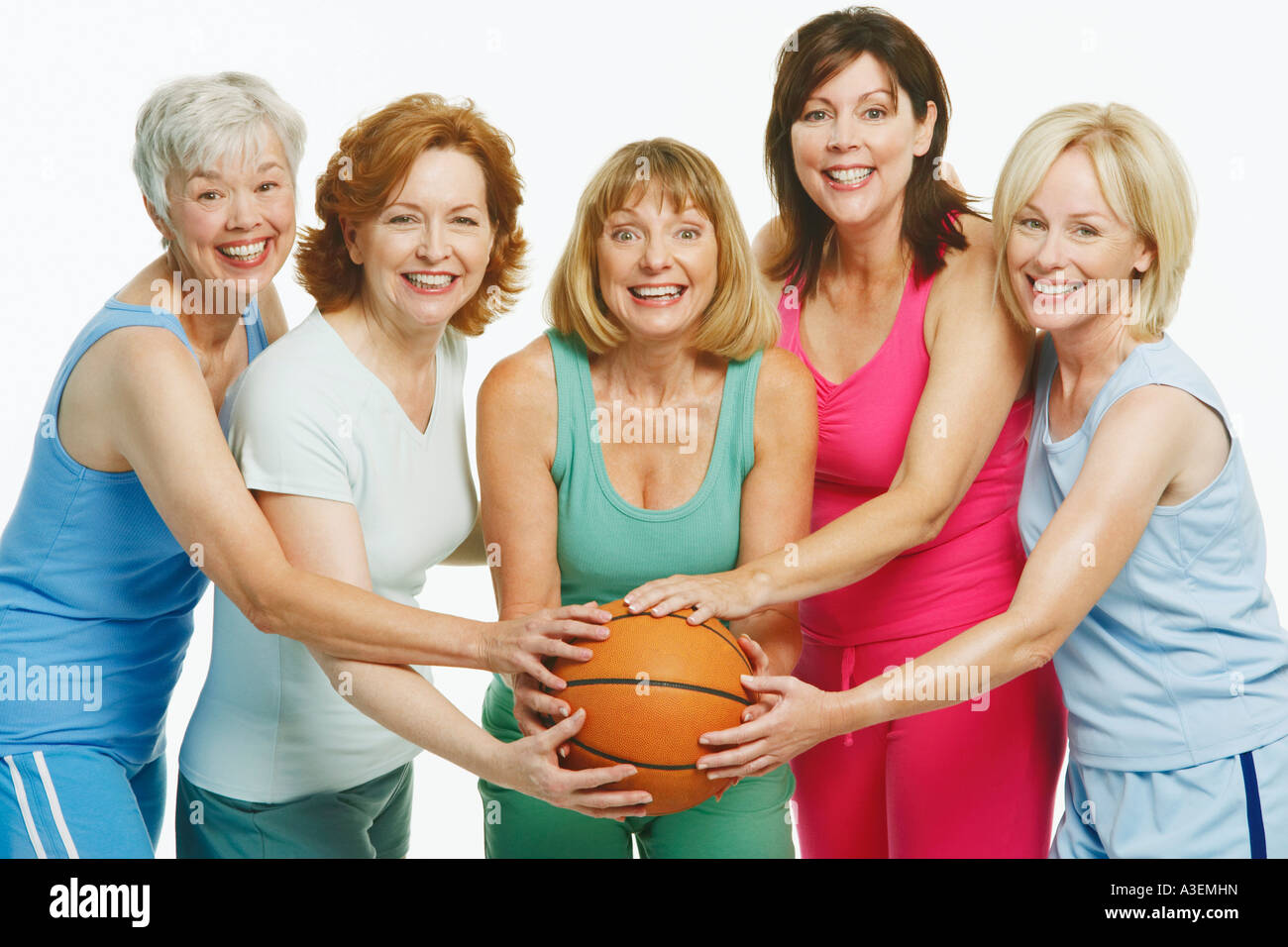 mture woman sport group Portrait of five mature women holding a basketball and smiling Stock Photo  - Alamy