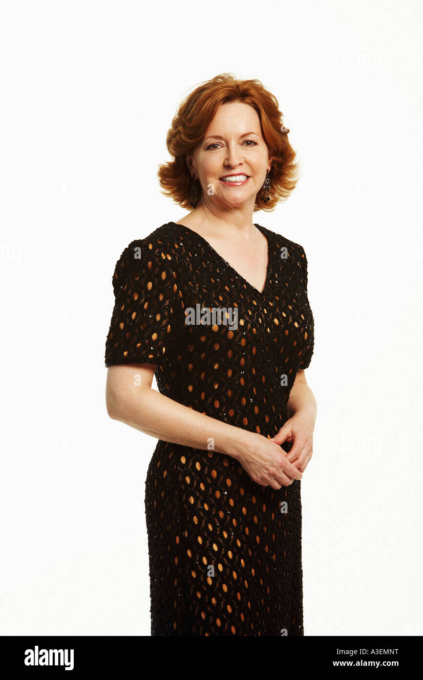 Portrait of a mature woman standing Stock Photo - Alamy