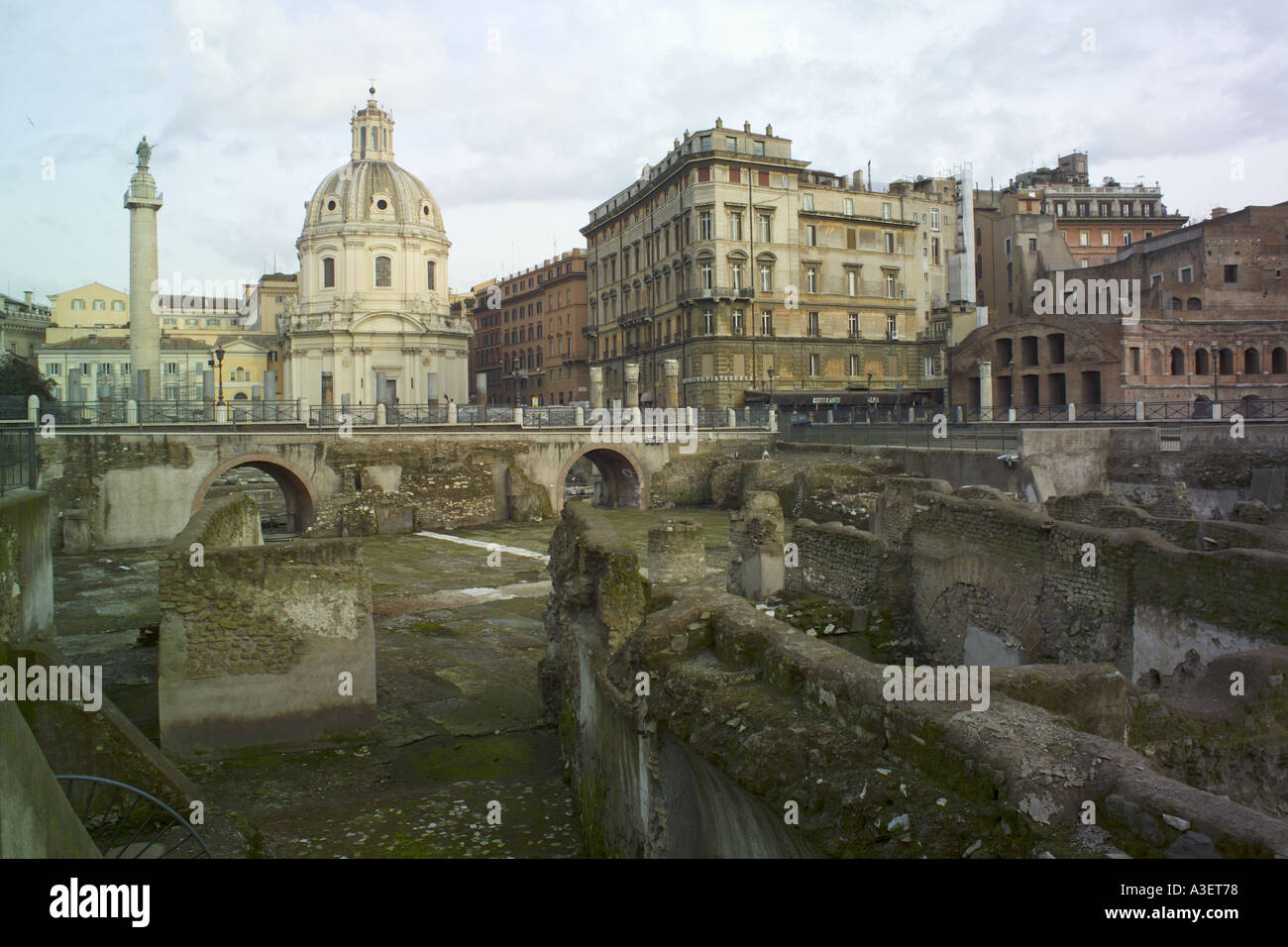 Rome Italy Europe The Eternal City The Eternal City view across ruins to the Trajan Forum Foro Traiano Stock Photo