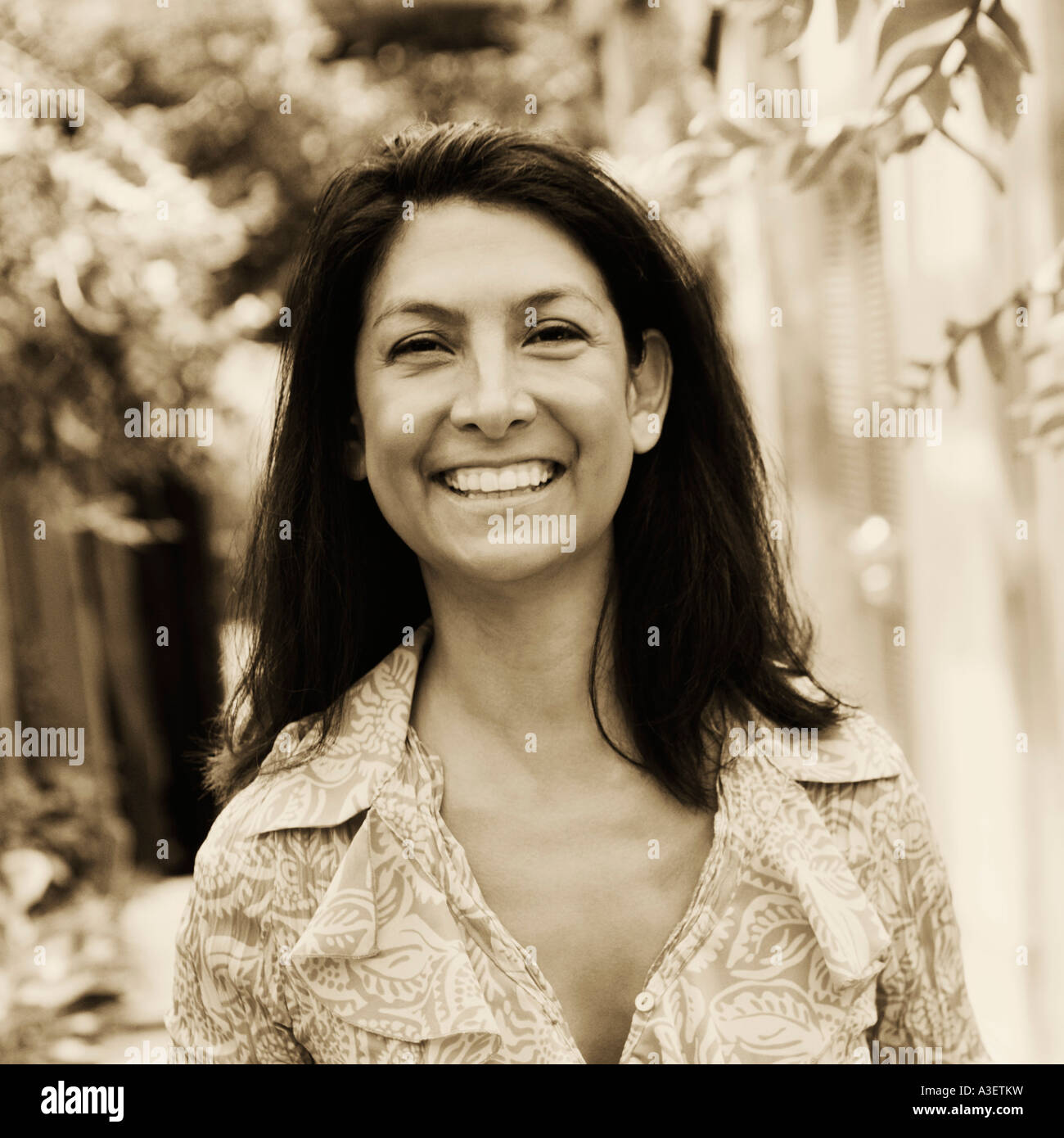 Portrait of a mature woman smiling Stock Photo - Alamy