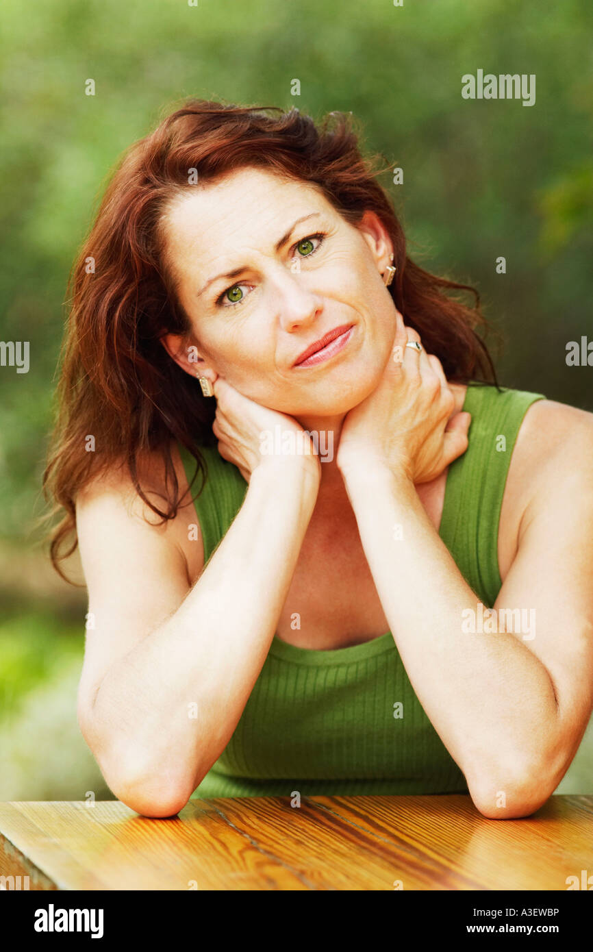 Portrait of a mature woman looking serious Stock Photo - Alamy