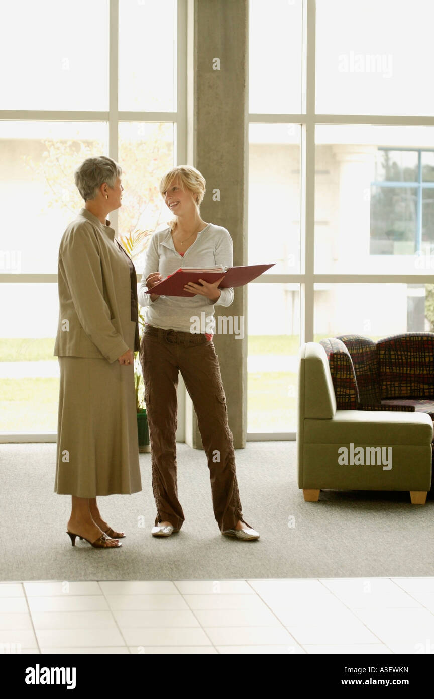 Two women talking hi-res stock photography and images - Alamy