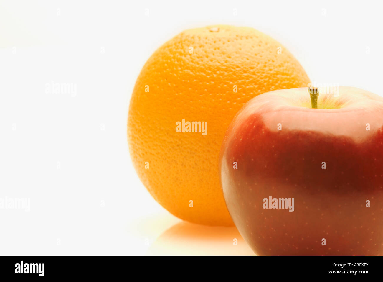 Orange and apple Stock Photo - Alamy