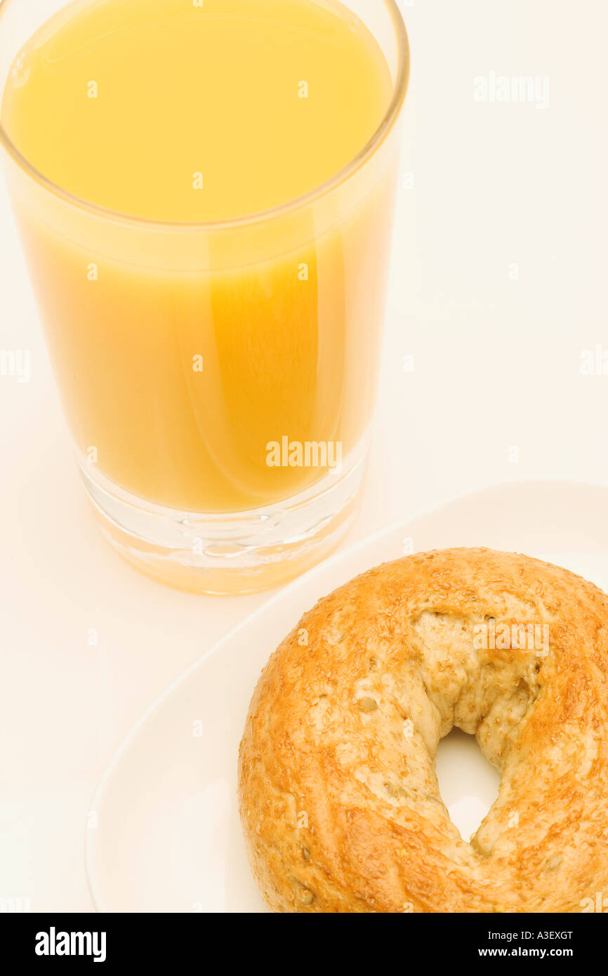 Orange juice and bagel Stock Photo Alamy