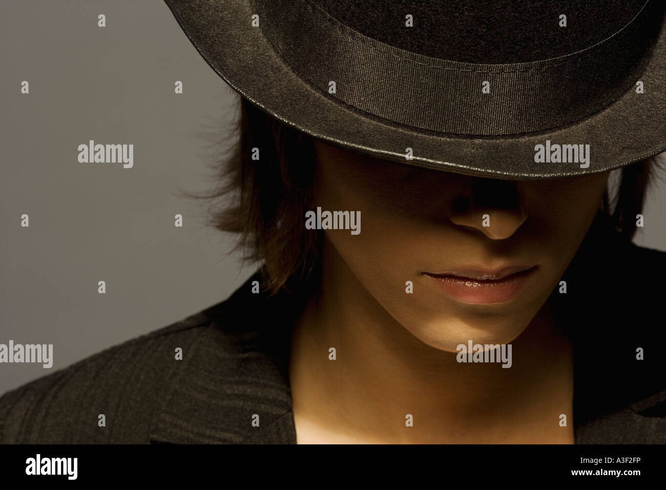 Young adults wearing hats hi-res stock photography and images - Alamy