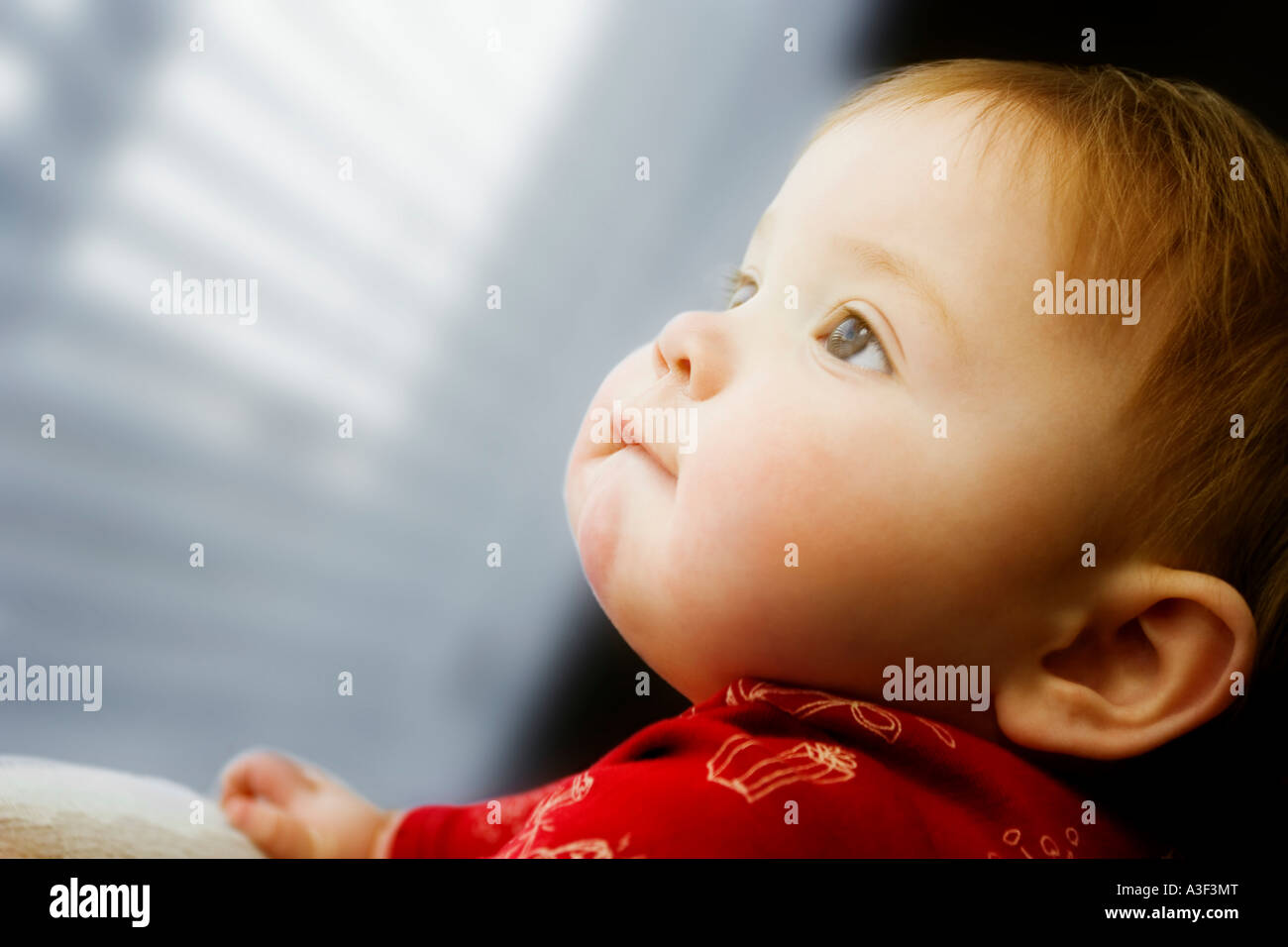 Child looking out window Stock Photo - Alamy