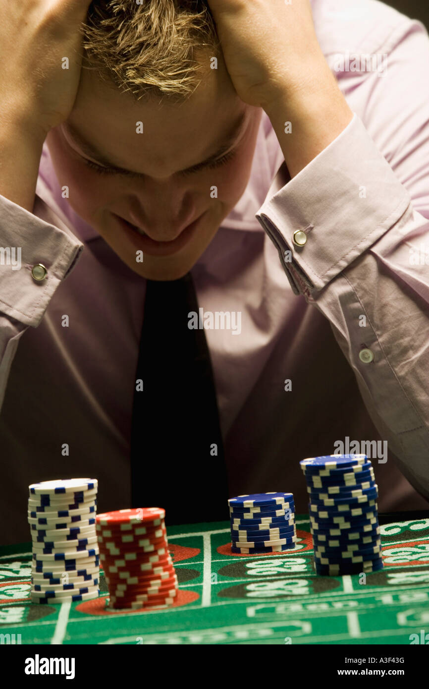 Man loosing at gambling Stock Photo