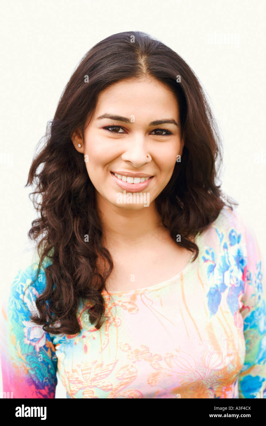 Portrait of a young woman smiling Stock Photo - Alamy