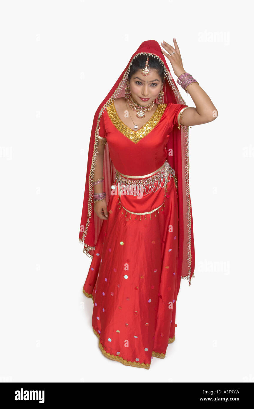 Portrait of a young woman in traditional Indian clothing Stock Photo ...