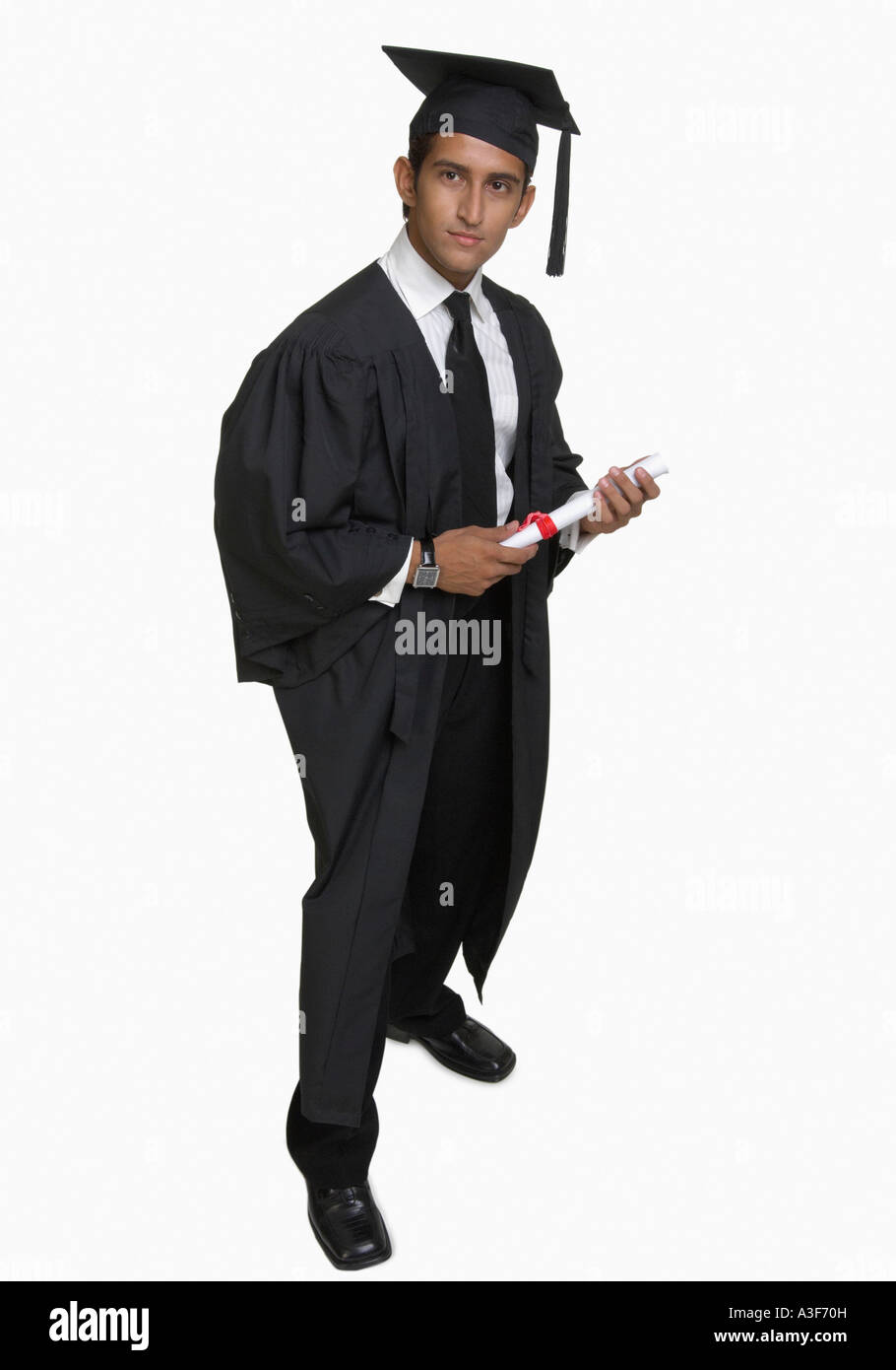 Portrait of a young man holding a diploma Stock Photo - Alamy