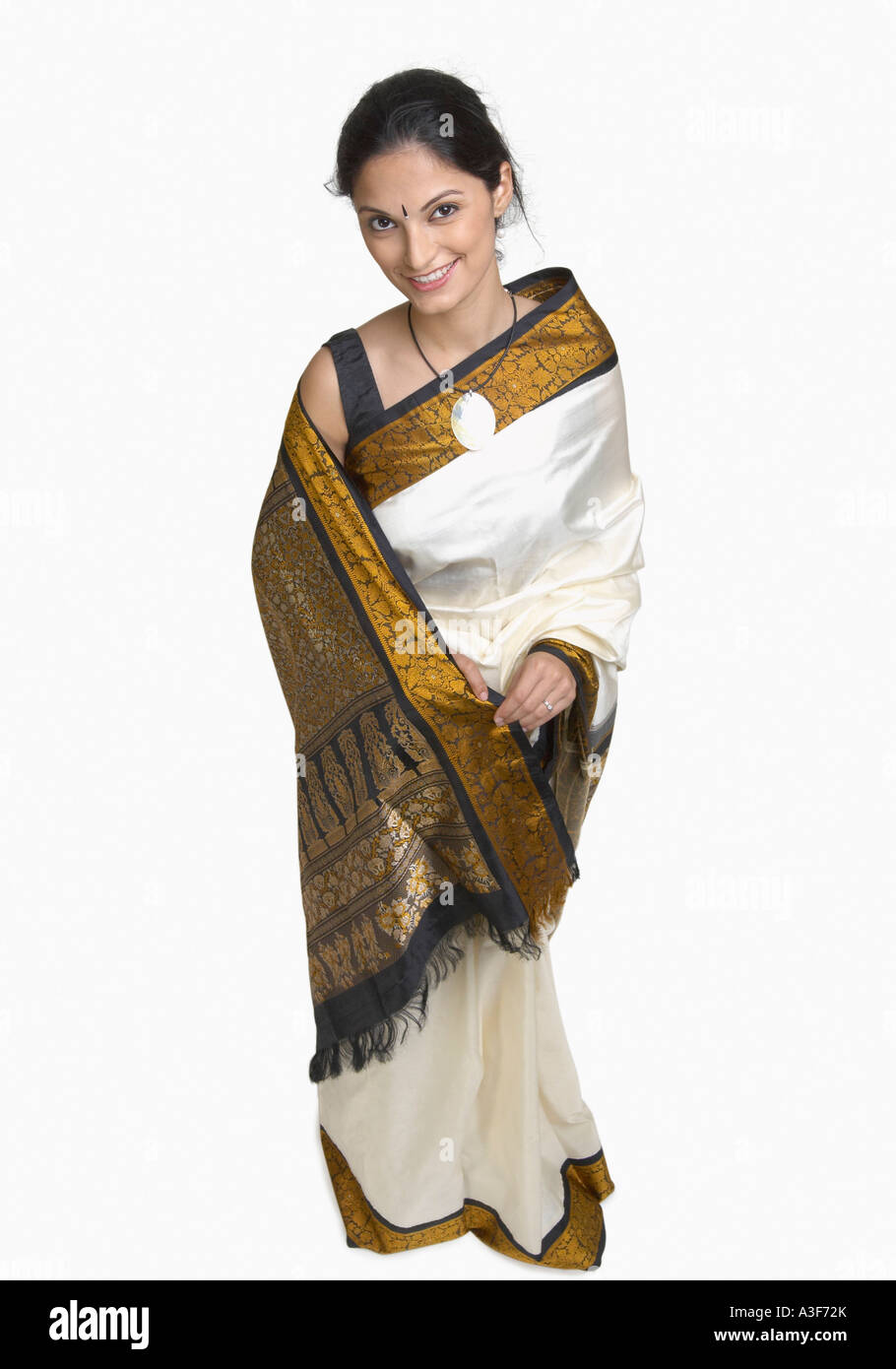 Portrait of a young woman wearing sari Stock Photo - Alamy