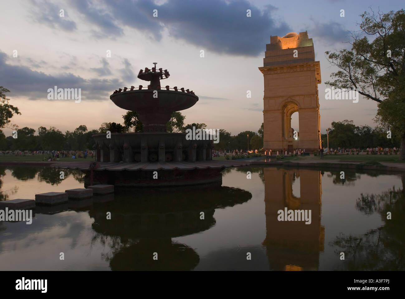 Reflection of a stone gateway in water at dusk, India Gate, New Delhi, India Stock Photo