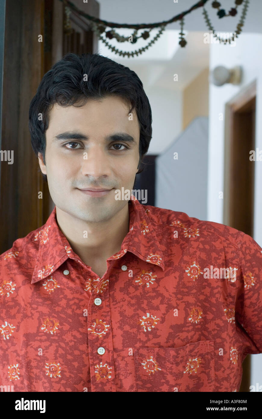 Portrait of a young man smiling Stock Photo - Alamy