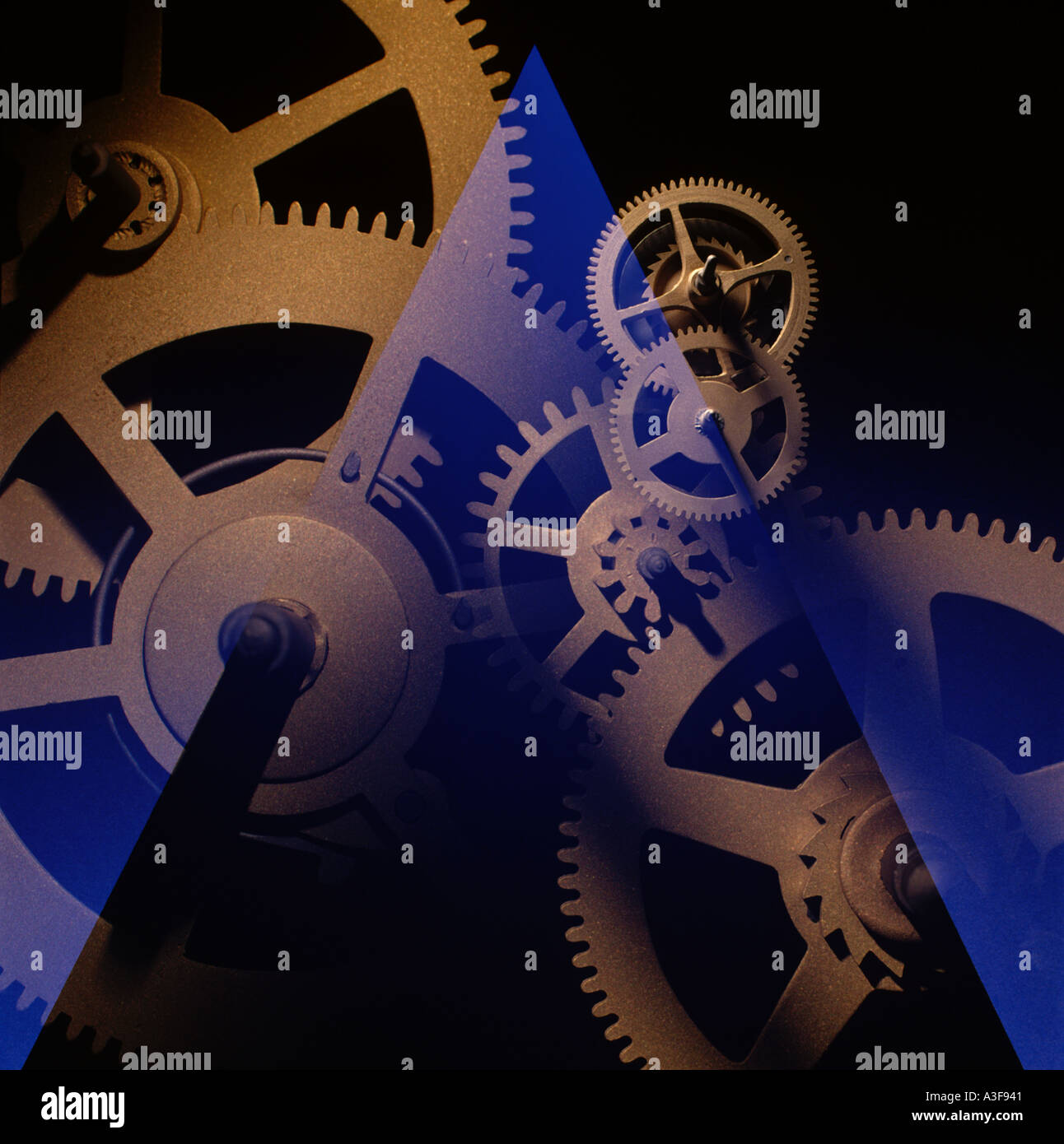 Clock gears with blue graphic Stock Photo - Alamy